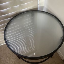 2 opaque glasstop side tables
