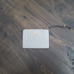 Michael Kors Cream Wristlet. 