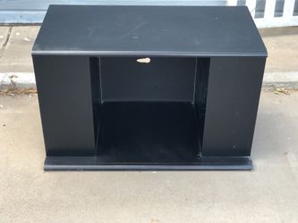 Black TV stand with 4 side storage areas