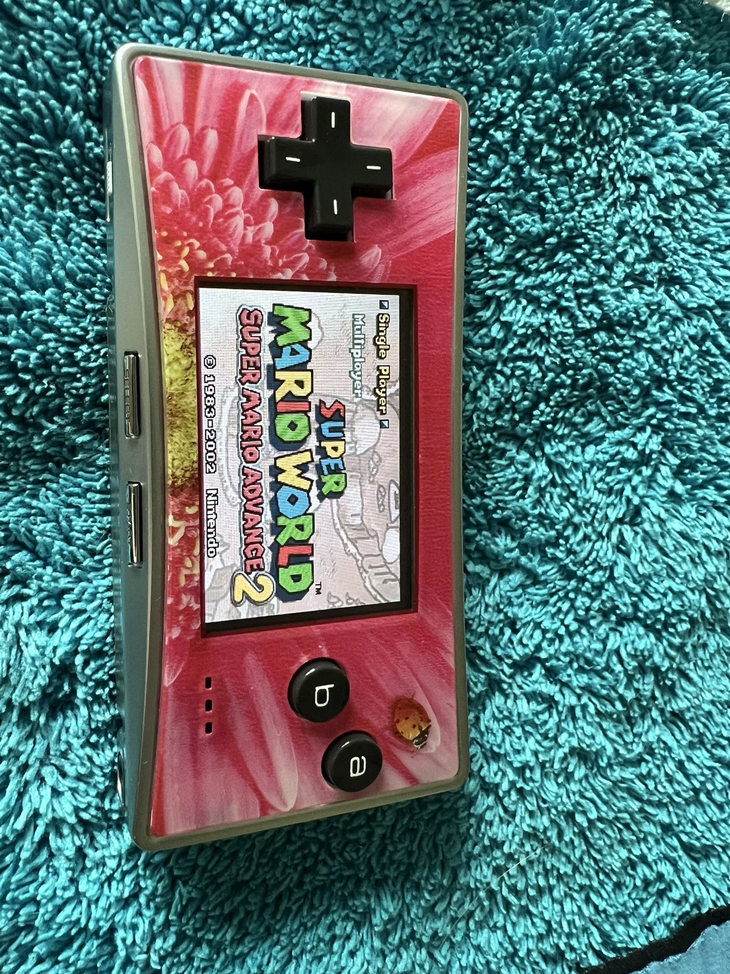 nintendo gameboy micro with super mario world and a charger for Sale in