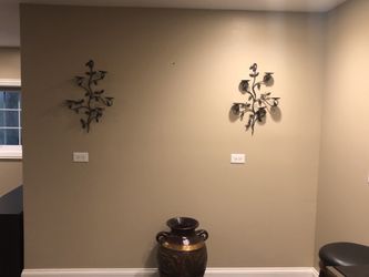 Cast iron wall candle holders