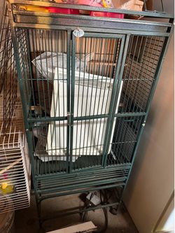 Bird cage with wheels