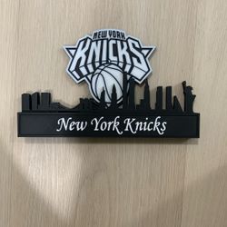New York Knicks logo and city