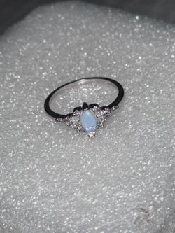 Elegant 925 silver ring for. The design includes small laboratory diamond stones
