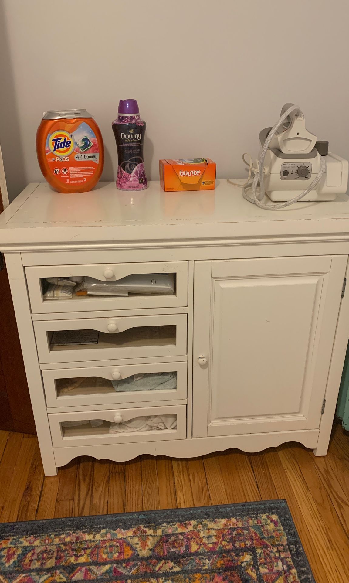Changing table repurposed as laundry room storage