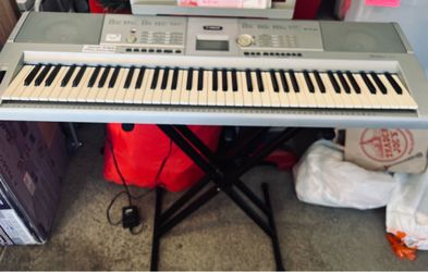 Yamaha Keyboard  w/stand & practice book