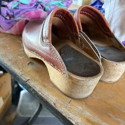 brown leather clogs with a wooden sole