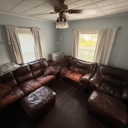 Large Italian leather Couches, Loveseat And Chair With Ottomans
