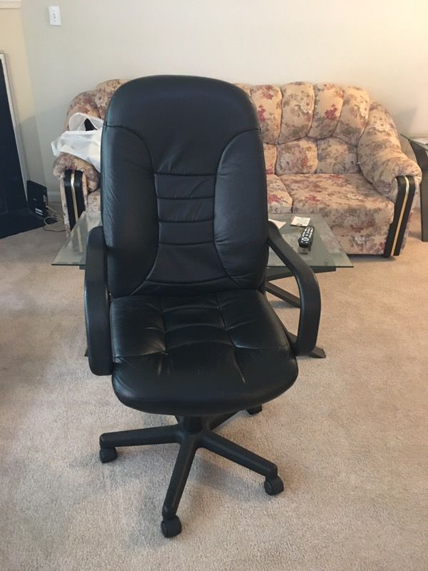 Black leather office rolling chair