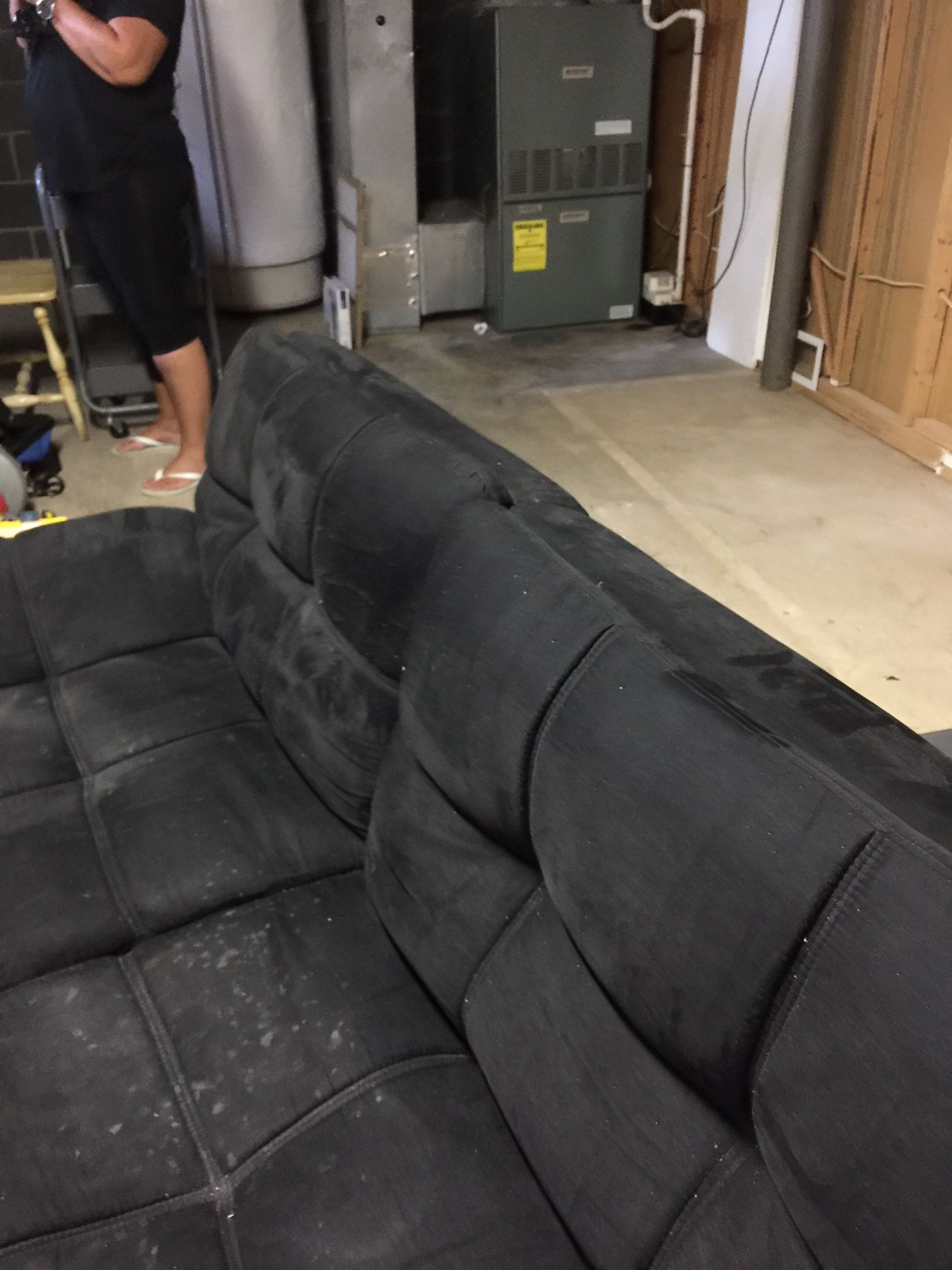 Black futon slightly soiled works well