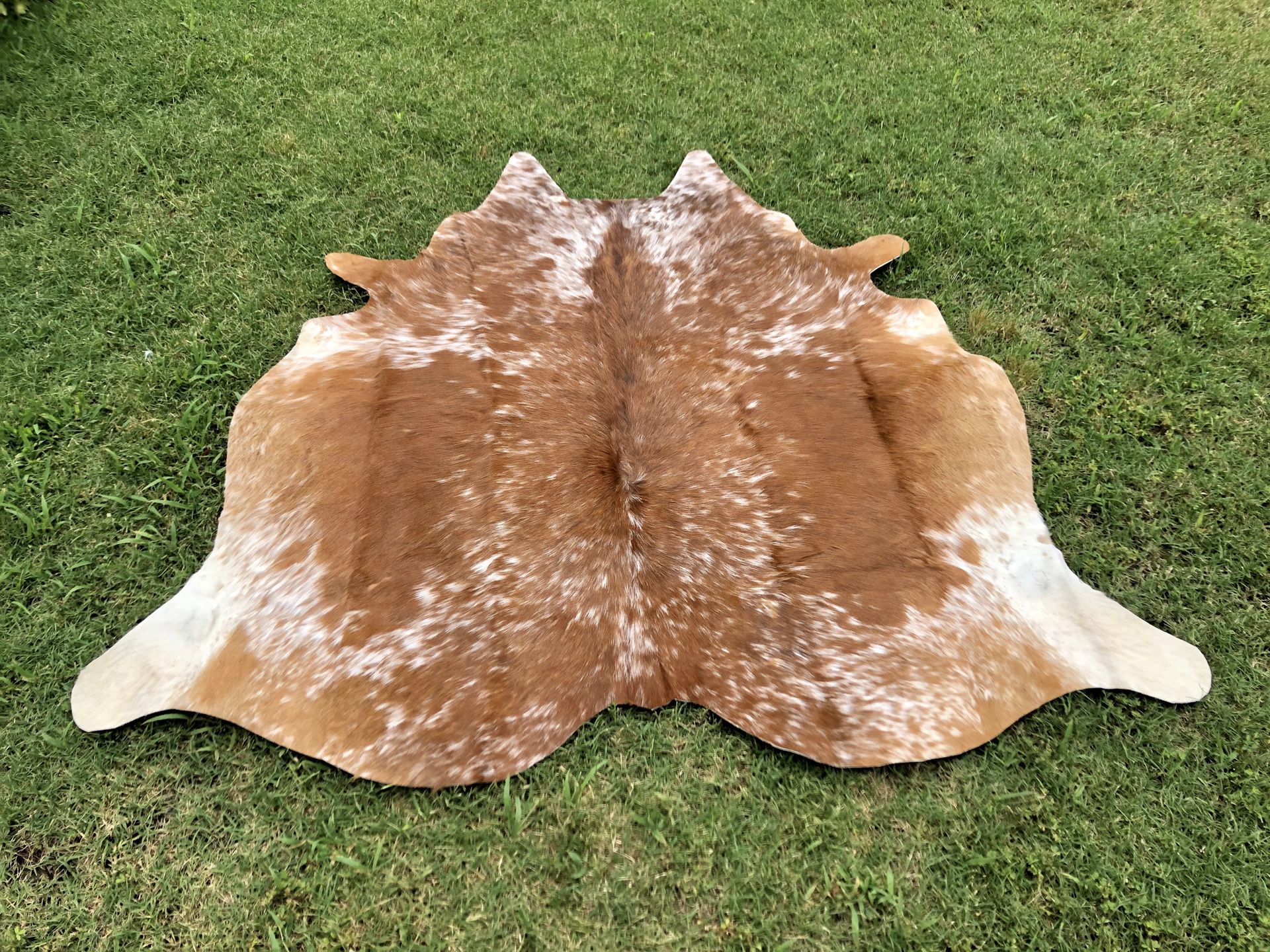 Small cowhide area rugs brown 5 ft x 4.5 ft