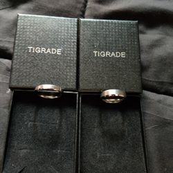 A Pair Of TIGRADE Wedding Bands