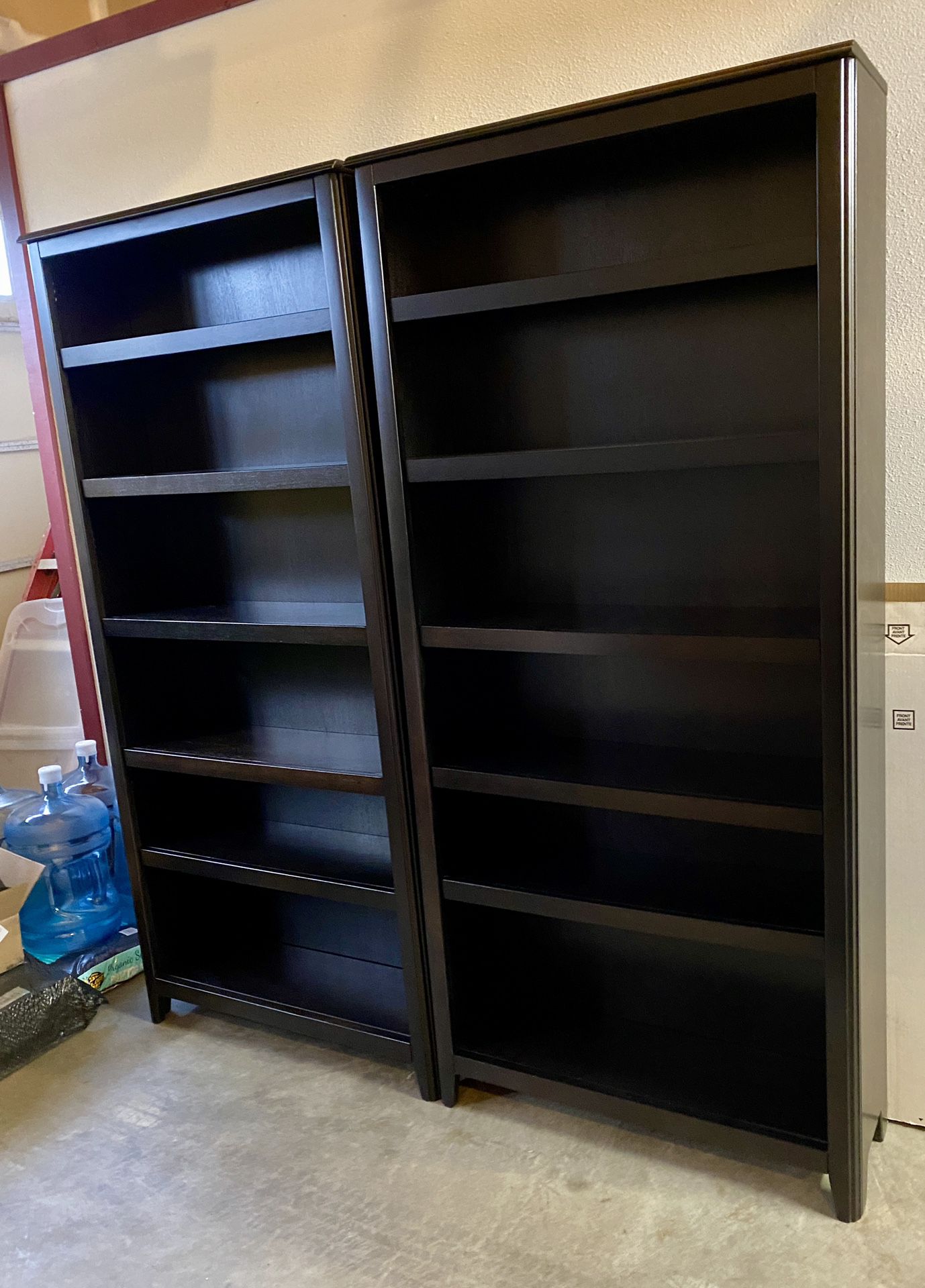 Two nice bookshelves almost black color (75 in tall)