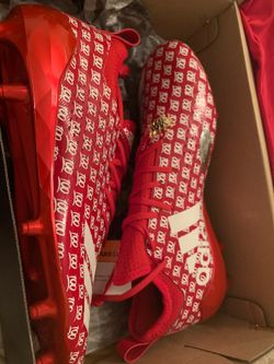 Adidas cleats size 10 w matching sleeve