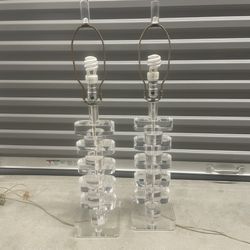 Pair of Mid-Century Modern Karl Springer Style Stacked Lucite Table Lamps that can be seen near the Miami Design District.
