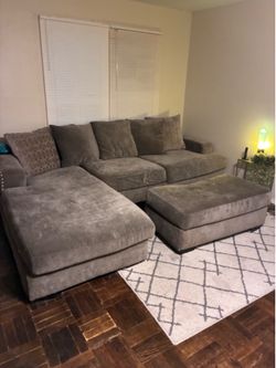 Gray sectional with chair & ottoman