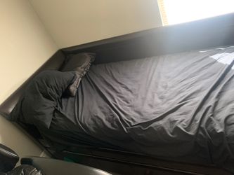 Double twin mattress bed. Mattress rolls out