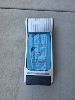 Shoe cover dispenser