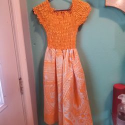 Hawaiian  ORANGE GIRLS DRESS..SIZE 8 -10 YRS OLD