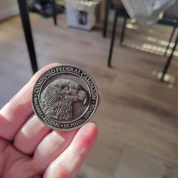Combined federal campaign coin,and 233 years of service the great white fleet coin