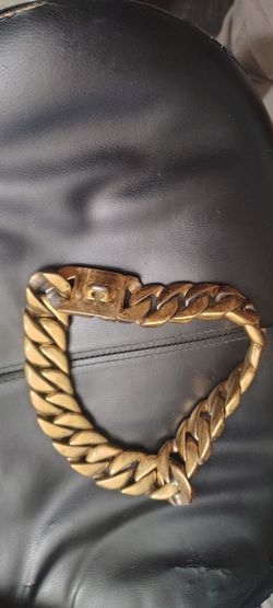 Dog harness with spikes and a chain