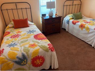 2 Metal twin beds.