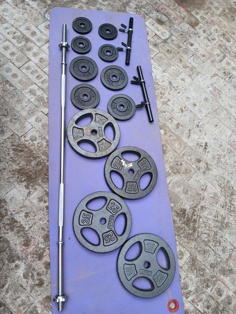 Standard weights plates with Barbell and Handlebars.