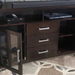 Simpli Home Kitchener solid wood tall TV media stand in a hickory brown finish. 