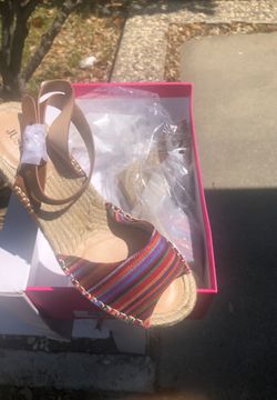 Brand new size 8 .5 wedge sandal