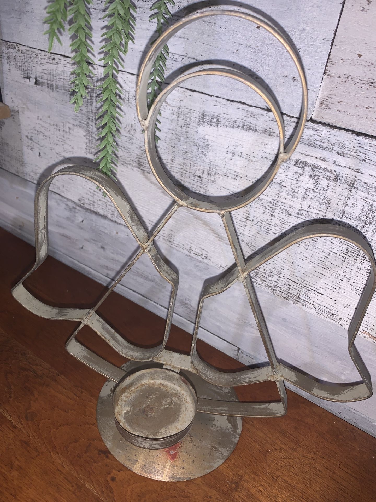 Metal angel candle holder with mini painted pot and floral