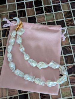 Large baroque freshwater pearl necklace, organic-style choker, piece featuring a lobster clasp