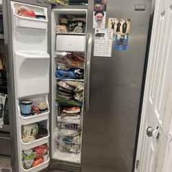 Frigidaire Side By Side Stainless Steel Fridge. Great condition for just $255!
