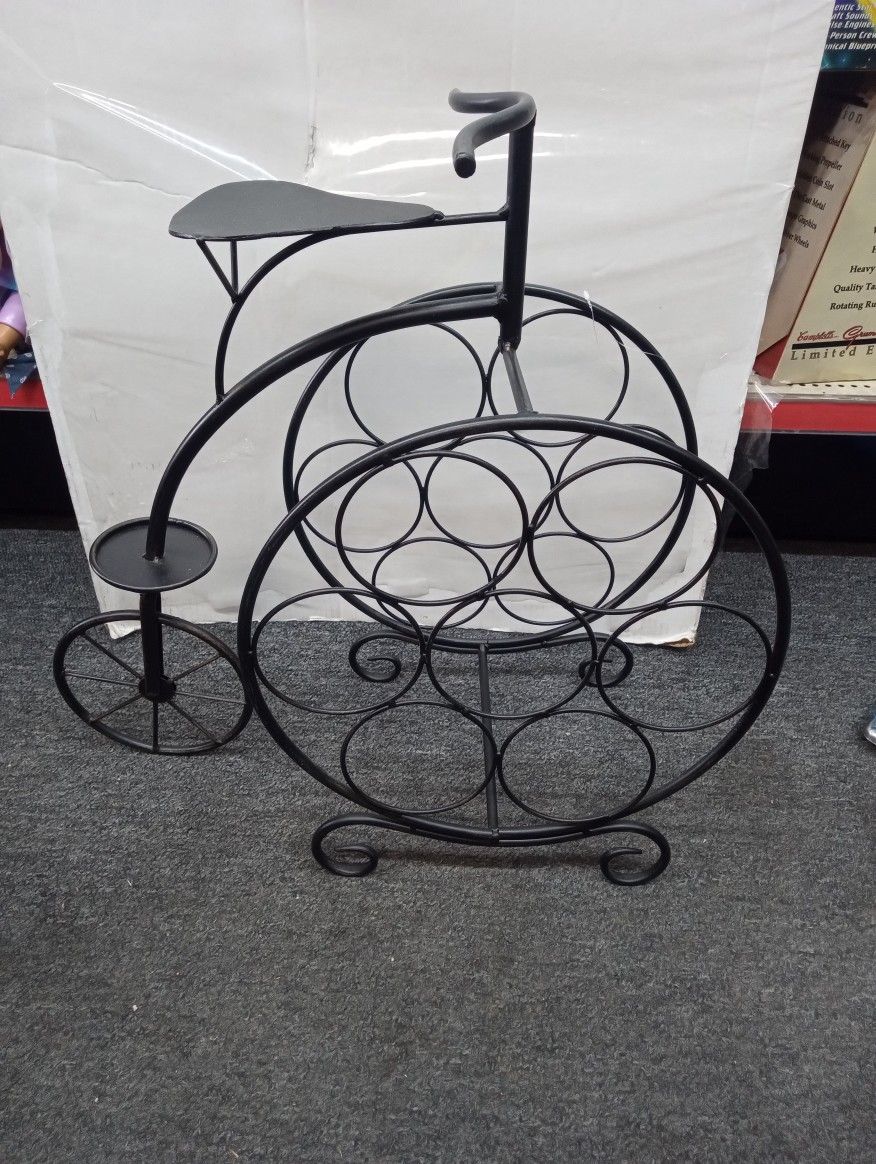 7 bottle Wine Rack in the Shape of a 19th Century Tricycle