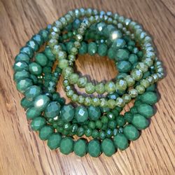 Bundle Of Green Beaded Bracelets