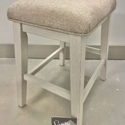 4 Count — Ashley Furniture 24" Counter Height Upholstered Barstool, Whitewash
