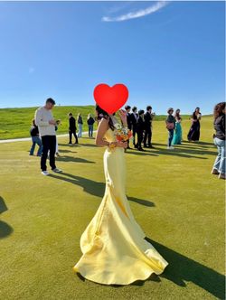 Yellow prom dress Sherri Hill -from Peaches