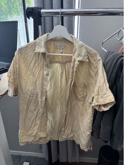 Yellow button down shirt