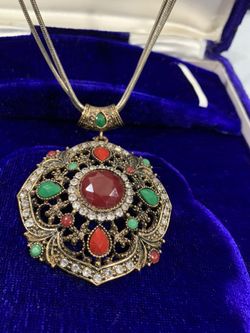 Antique pendant with long chain