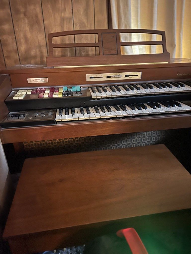 Organ with bench and sheet mysic