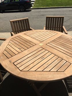 Teak table with 4 chairs from https://offerup.com/redirect/?o=cGF0aW8uY29t plus tea cart