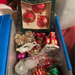 Multiple Christmas Ornaments And Two Houses