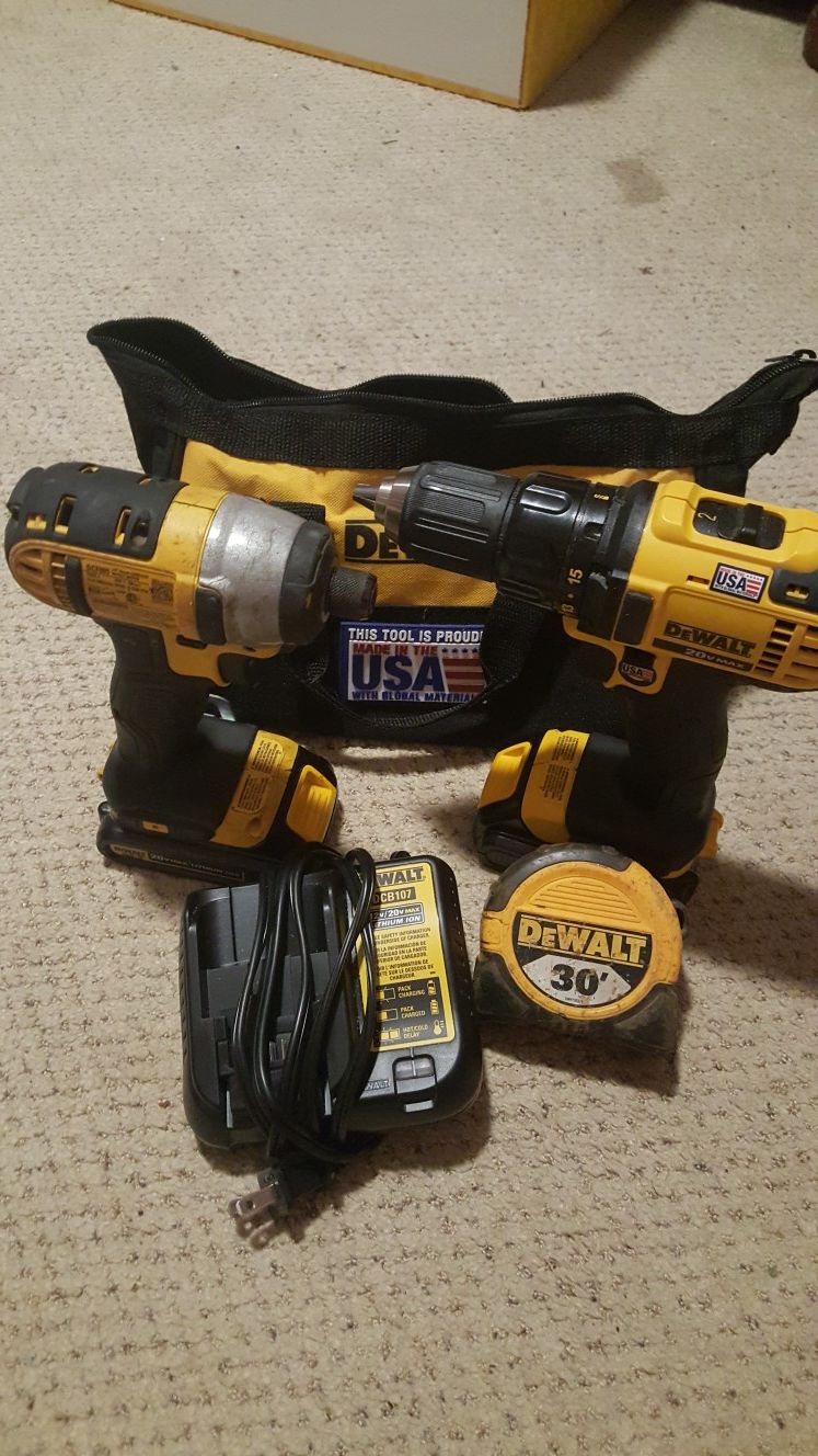 Dewalt 1,impak drill ,1 drill ,2 battery s ,1 charger, 1 measure tape,and bag.