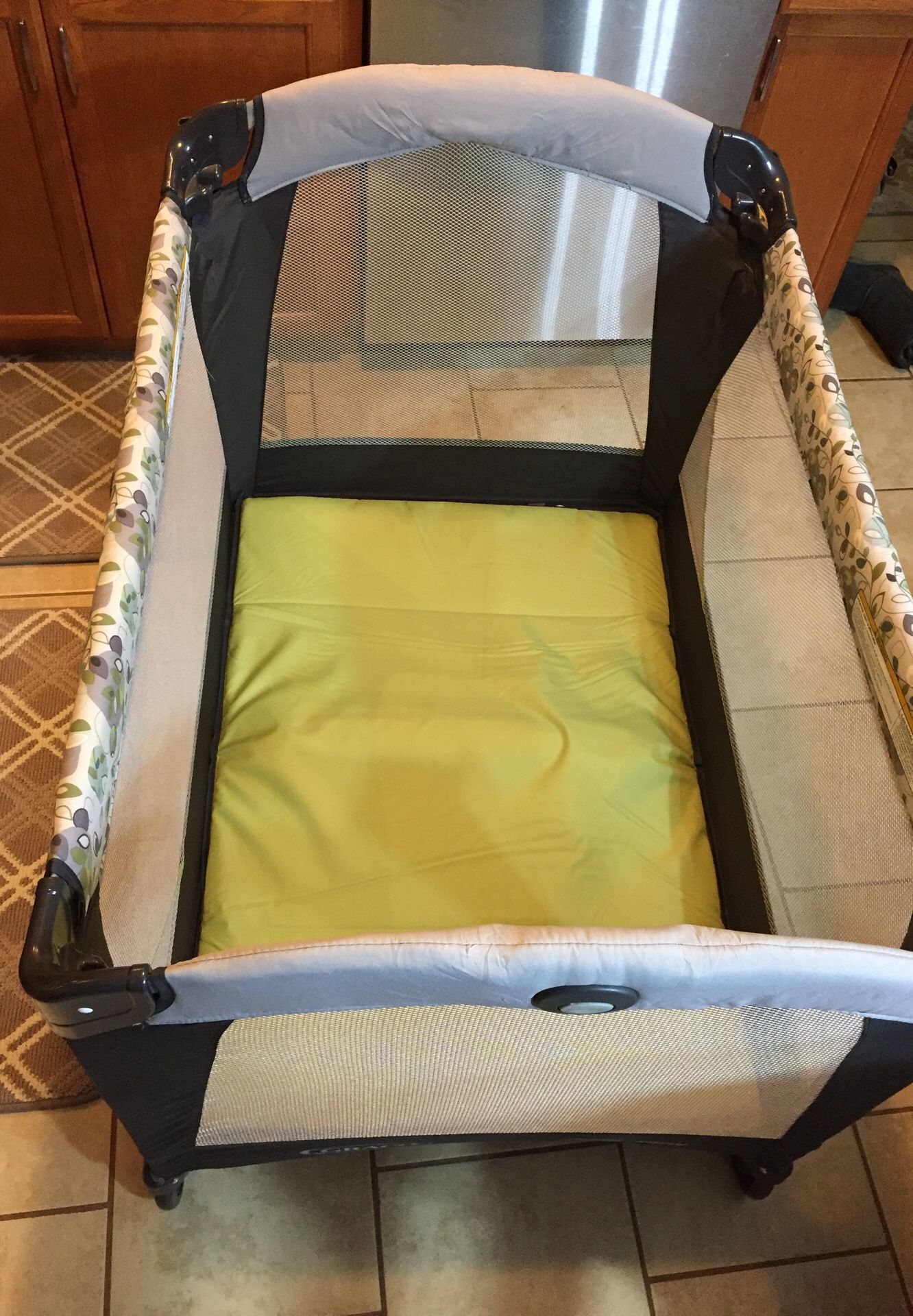 Graco Playpen with bassinet, changing table, napper, music/nature sounds