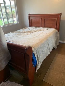 Full bed with dresser and night stand