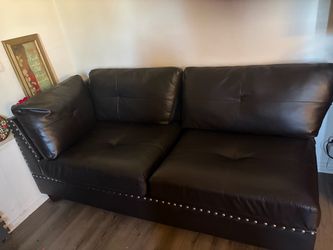 Dark Brown Leather Sofa with Nailhead Trim and foot rest