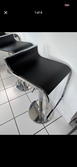 Set of 3 original Modani counter stools.