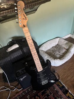 Squier Stratocaster & fender mustang lt25 amp combo