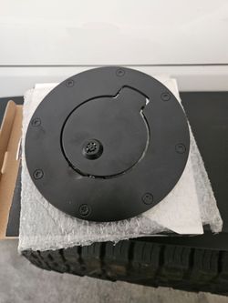 New RT Off-Road black locking fuel door for Jeep Wrangler JK.