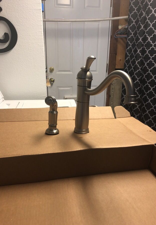 Brushed nickel kitchen faucet with sprayer