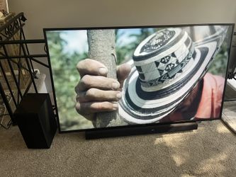 Sony 64” TV With LG Sound Bar And Bass